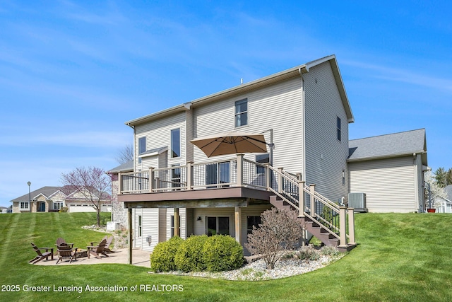 12714 Ospreys Way, Dewitt, MI 48820 - back of house featuring a patio, a deck, a yard, and a fire pit