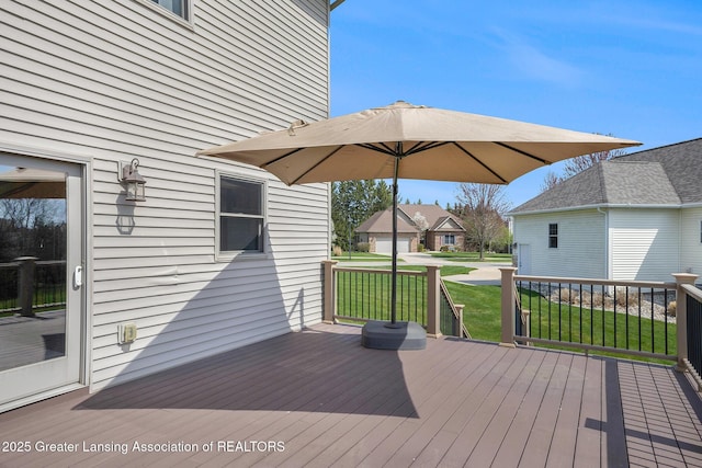 12714 Ospreys Way, Dewitt, MI 48820 - wooden deck featuring a lawn