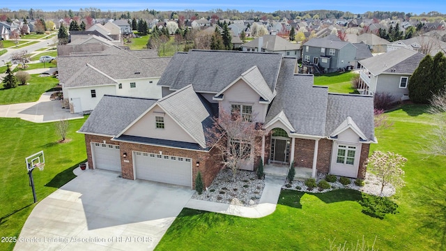 12714 Ospreys Way, Dewitt, MI 48820 - view of front facade featuring driveway, a front lawn, a residential view, and brick siding