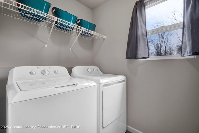 12001 Bryde Dr, Rives Junction, MI 49277 - clothes washing area featuring laundry area and washing machine and clothes dryer