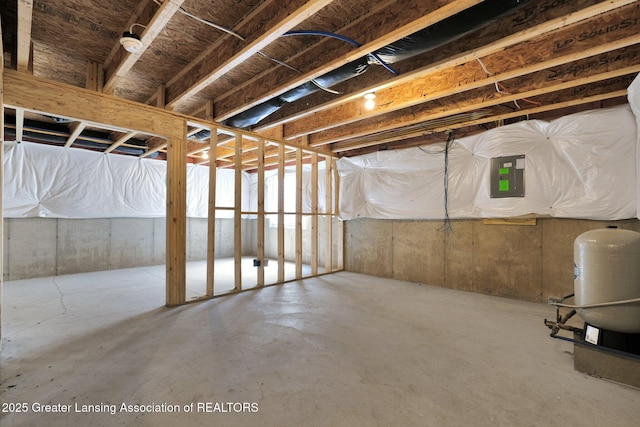 12001 Bryde Dr, Rives Junction, MI 49277 - unfinished basement featuring electric panel