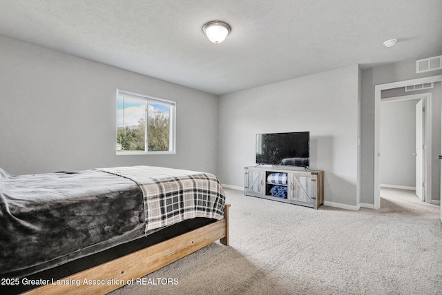 12001 Bryde Dr, Rives Junction, MI 49277 - carpeted bedroom featuring baseboards and visible vents