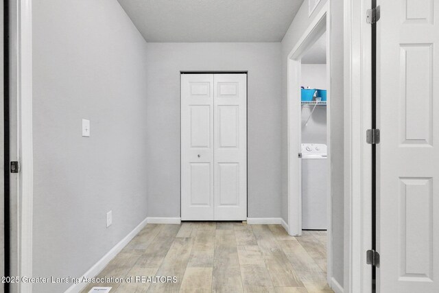 12001 Bryde Dr, Rives Junction, MI 49277 - interior space featuring light wood-type flooring and baseboards