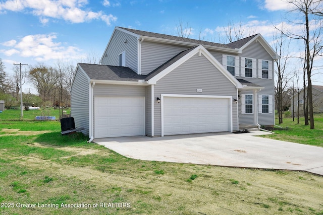 12001 Bryde Dr, Rives Junction, MI 49277 - view of front of property with an attached garage, a shingled roof, driveway, and a front yard