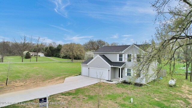 12001 Bryde Dr, Rives Junction, MI 49277 - view of home's exterior featuring an attached garage, roof with shingles, a yard, and concrete driveway