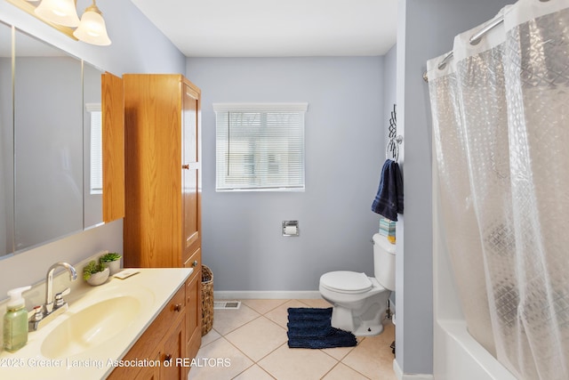 bathroom featuring vanity, tile patterned floors, toilet, visible vents, and a shower with shower curtain