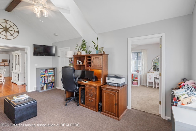 office with carpet, lofted ceiling with beams, a ceiling fan, and baseboards