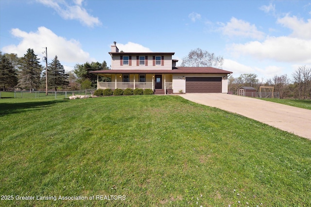 view of front of home featuring fence, a front lawn, a garage, a porch, and driveway