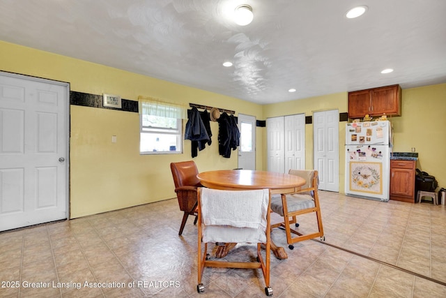 dining area with recessed lighting
