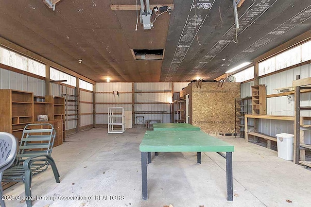 interior space with unfinished concrete floors