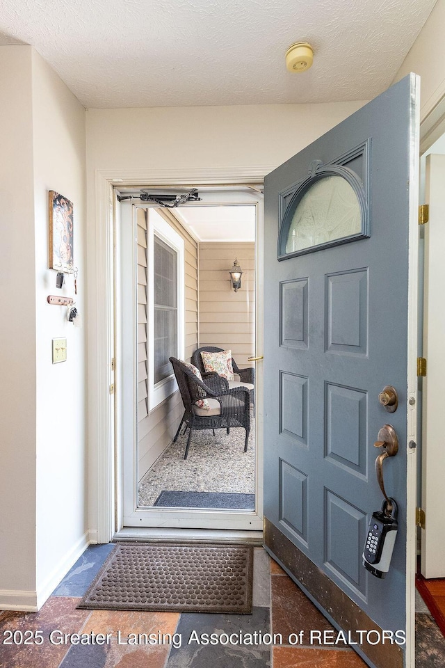 entrance to property with covered porch
