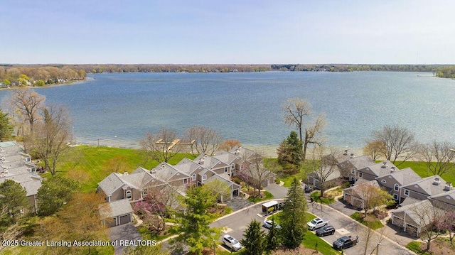 birds eye view of property with a residential view and a water view