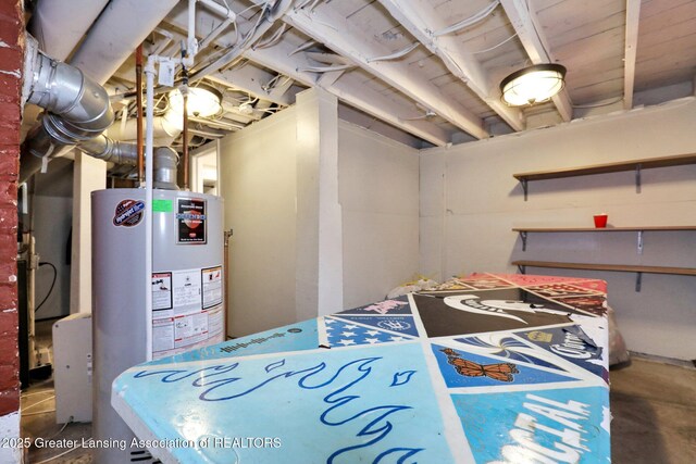 unfinished below grade area featuring gas water heater