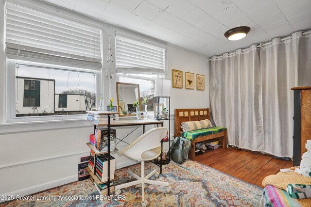 sitting room featuring wood finished floors