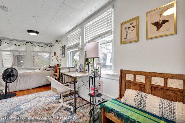 bedroom with wood finished floors