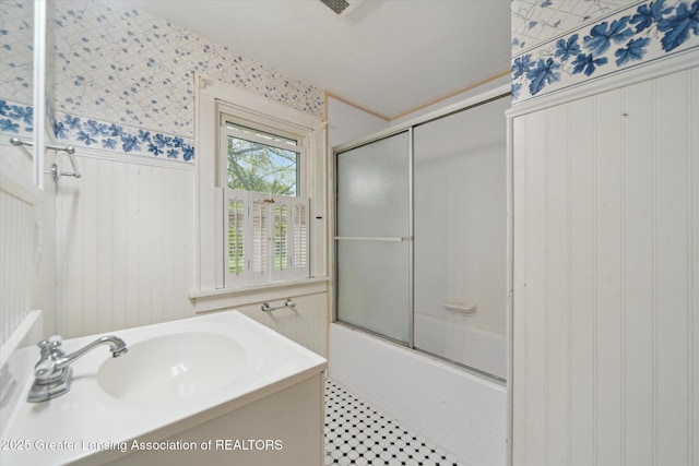 12102 Rupp Rd, Grand Ledge, MI 48837 - bathroom featuring shower / bath combination with glass door and a sink
