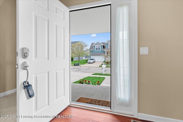 609 E Avocet Dr, East Lansing, MI 48823 - foyer entrance featuring baseboards