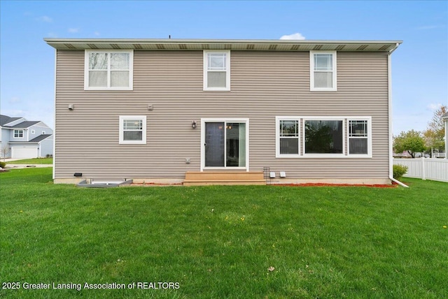 609 E Avocet Dr, East Lansing, MI 48823 - rear view of property featuring entry steps