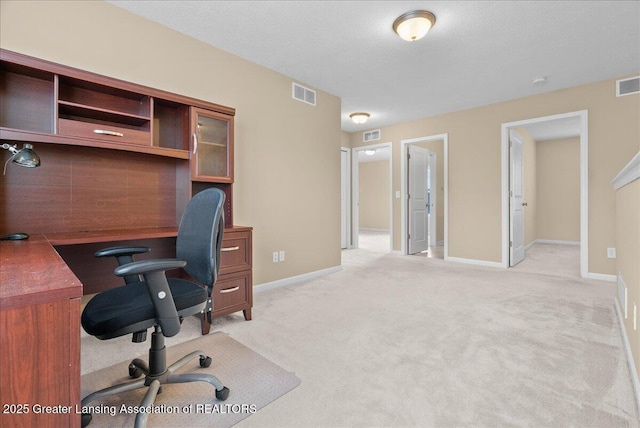 609 E Avocet Dr, East Lansing, MI 48823 - office featuring light colored carpet and baseboards
