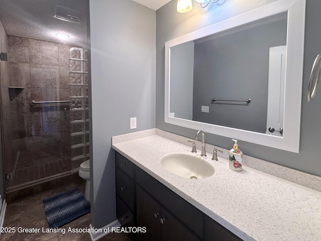 2718 Kittansett Dr, Okemos, MI 48864 - full bathroom featuring a shower stall, toilet, vanity, and a textured ceiling