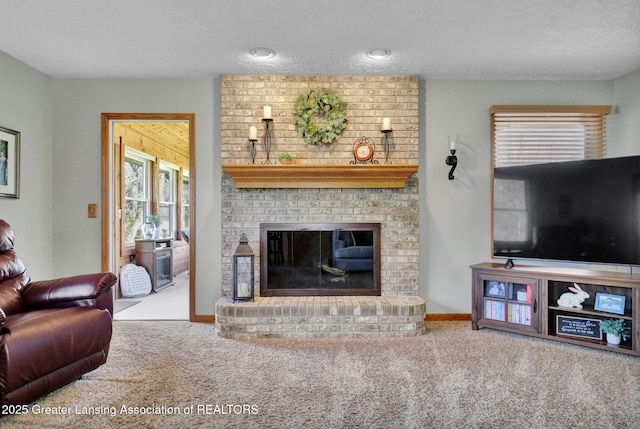 11267 Jarvis Hwy, Dimondale, MI 48821 - carpeted living room with a brick fireplace and a textured ceiling