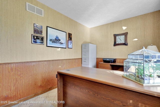 11267 Jarvis Hwy, Dimondale, MI 48821 - office area with wallpapered walls and visible vents