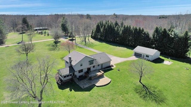 11267 Jarvis Hwy, Dimondale, MI 48821 - drone / aerial view featuring a view of trees