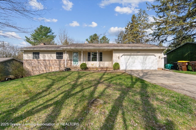 1310 Schavey Rd, Dewitt, MI 48820 - ranch-style home featuring driveway, brick siding, a front lawn, and a garage
