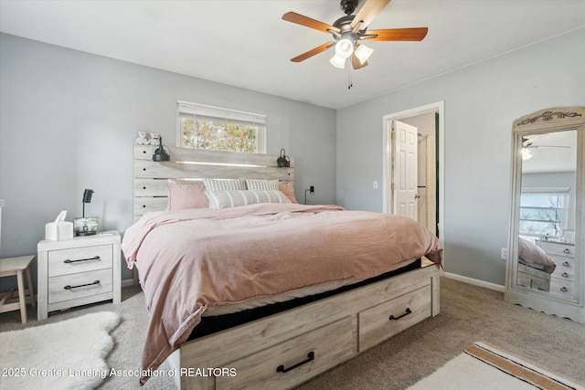 1310 Schavey Rd, Dewitt, MI 48820 - carpeted bedroom with ceiling fan and multiple windows