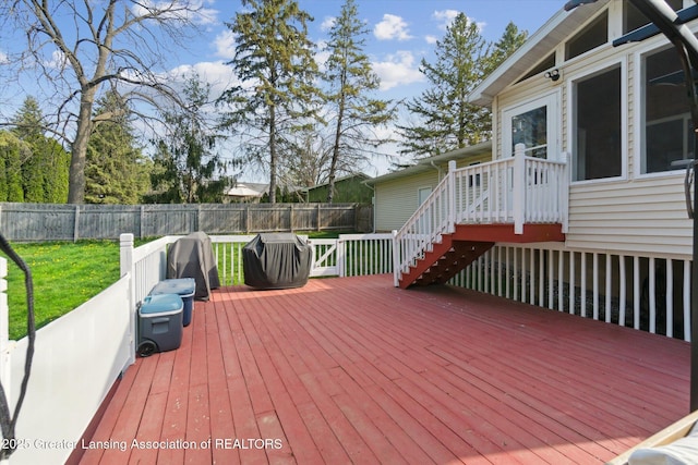 1310 Schavey Rd, Dewitt, MI 48820 - wooden deck featuring a fenced backyard and a yard