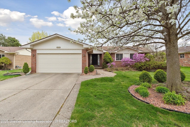 ranch-style house with a garage, brick siding, a front yard, and concrete driveway