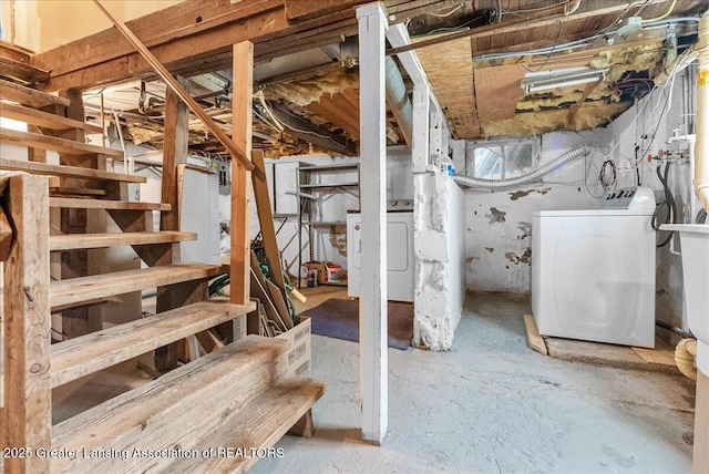 unfinished basement with washer / dryer