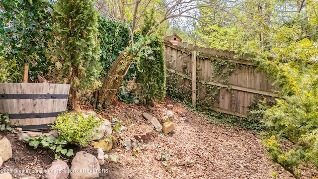 view of yard featuring fence