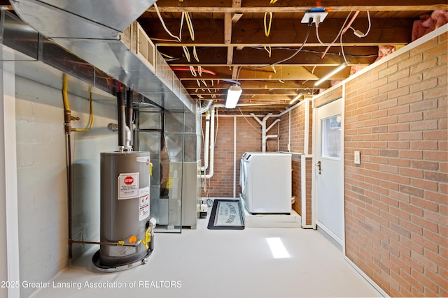 unfinished basement featuring heating unit, gas water heater, and brick wall
