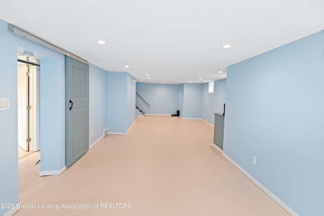 interior space with recessed lighting, baseboards, and stairway
