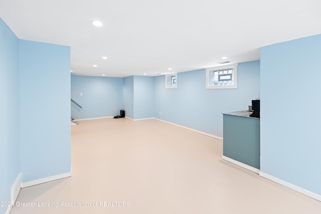below grade area with recessed lighting, baseboards, and visible vents