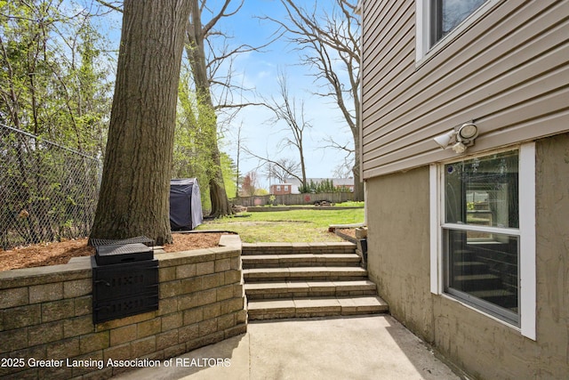 view of patio with a fenced backyard