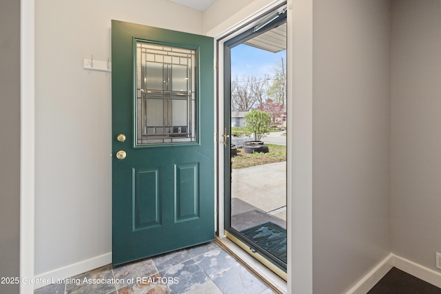 doorway with baseboards