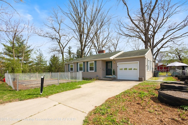 ranch-style house featuring a garage, fence, a chimney, and concrete driveway