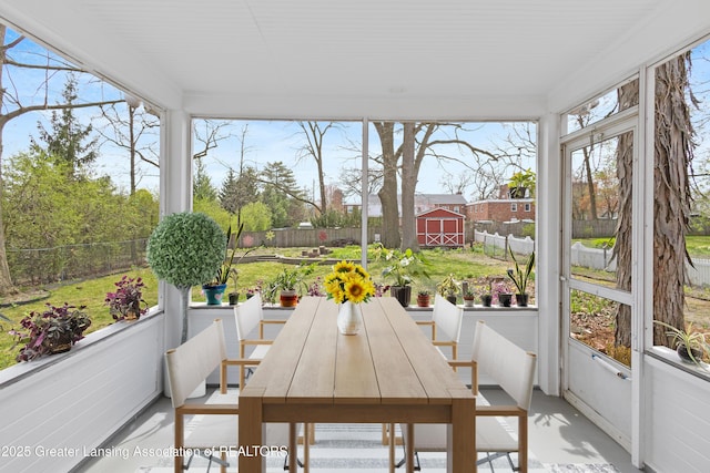 sunroom with concrete flooring