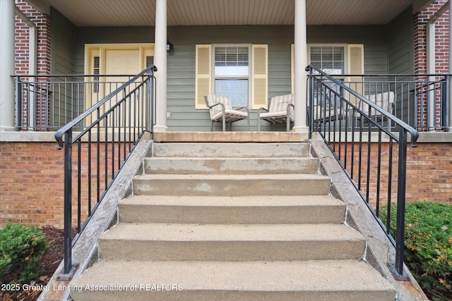 property entrance with covered porch