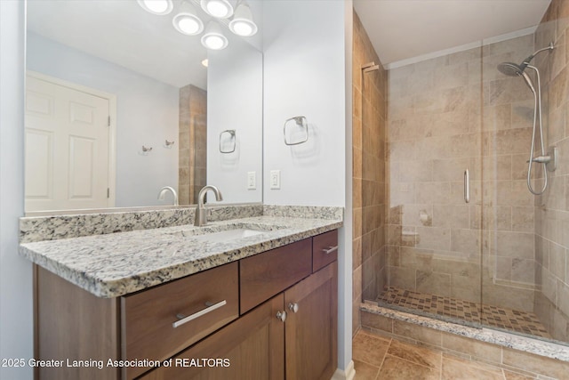 full bath featuring vanity and a stall shower