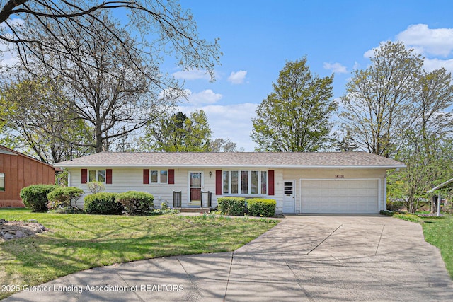 ranch-style house with an attached garage, concrete driveway, and a front yard
