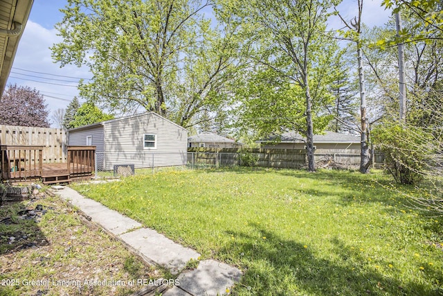 601/603 Farmstead Ln, Lansing, MI 48917 - view of yard featuring a deck