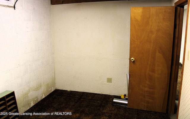 empty room with concrete block wall