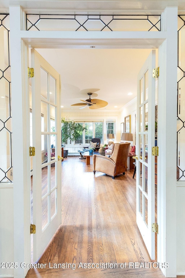 620 Ardson Rd, East Lansing, MI 48823 - living room with french doors, wood finished floors, and a ceiling fan