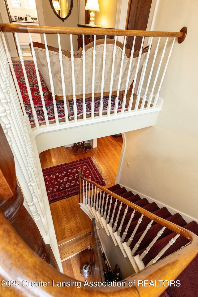 620 Ardson Rd, East Lansing, MI 48823 - stairway with wood finished floors