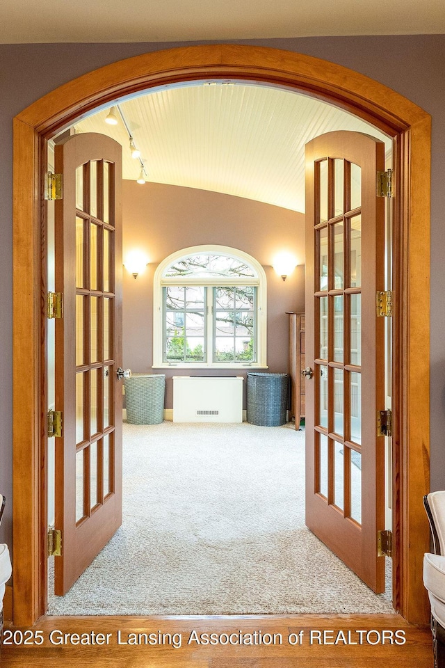 620 Ardson Rd, East Lansing, MI 48823 - interior space with carpet, french doors, and rail lighting