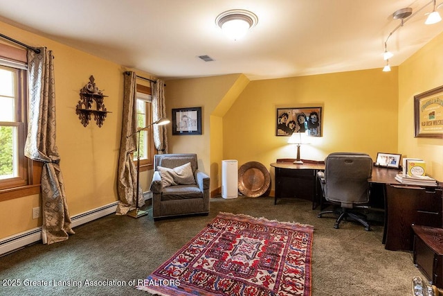 620 Ardson Rd, East Lansing, MI 48823 - carpeted office space with plenty of natural light, rail lighting, and a baseboard radiator