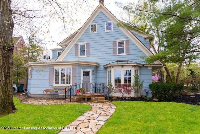 620 Ardson Rd, East Lansing, MI 48823 - view of front of property with a front yard
